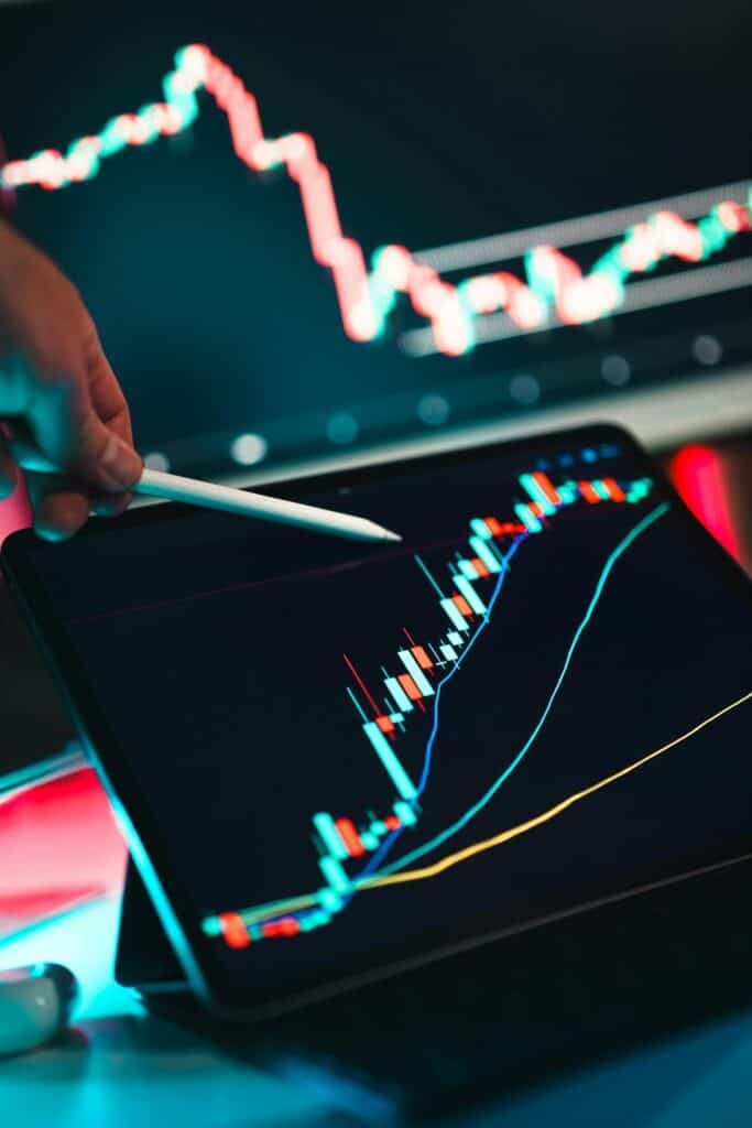 close-up-of-cryptocurrency-trading-analysis-on-a-683x1024 🔔 Closing Bell: Bulls Hold the Line as Sensex Climbs 182 Points, Nifty Stays Strong Above 24,650